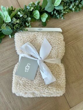 UGG Cozy Sherpa Throw Blanket in Cream with White Bow